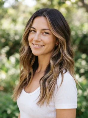 Sun-Kissed Highlights on Wavy Brunette Hair